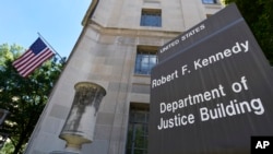 FILE - A view of the U.S. Justice Department in Washington, Aug. 27, 2015.