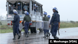 Police monitoring situation in Harare during Zimbabwe three-day protests, Jan. 2019.