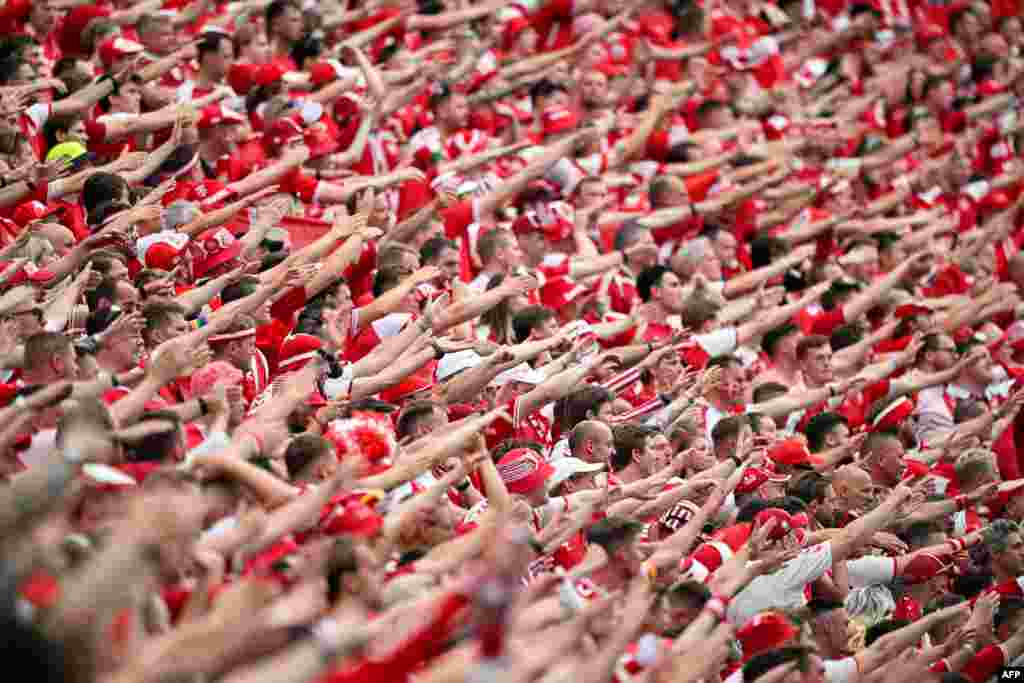 Fans of Denmark cheer during the UEFA Euro 2024 Group C football match between Denmark and England at the Frankfurt Arena in Frankfurt, Germany.