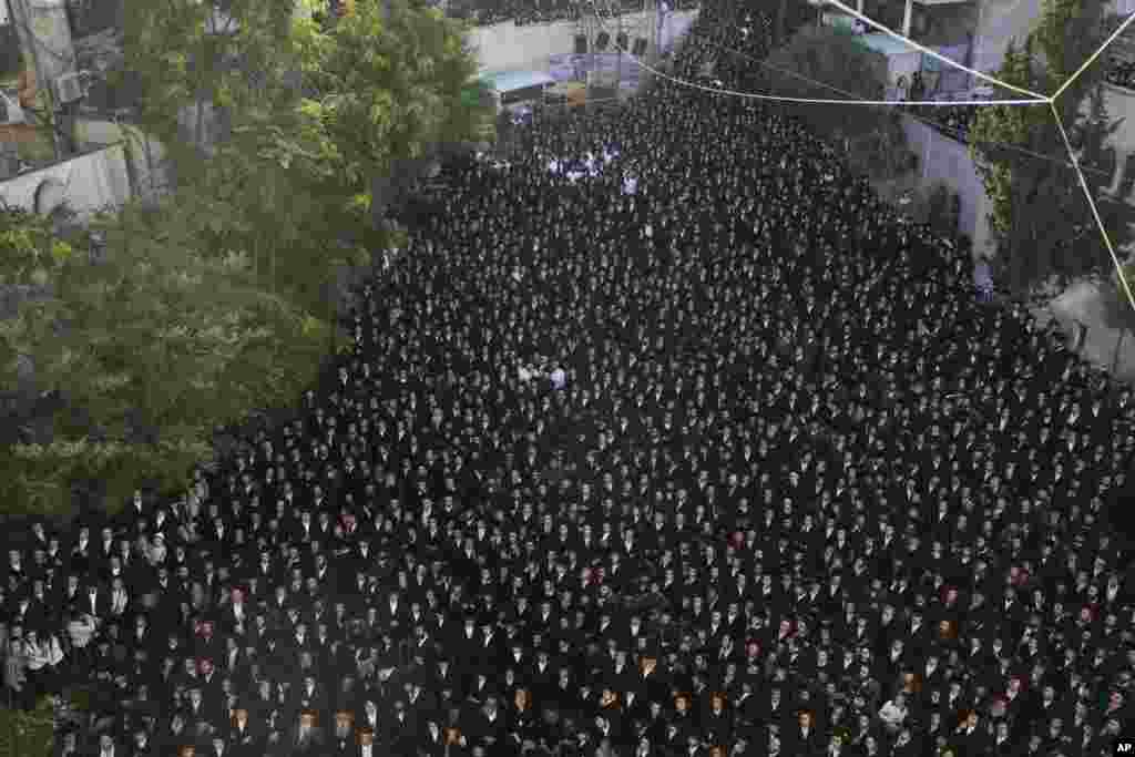Ultra-Orthodox Jewish men attend a rally against army recruitment in Jerusalem. Israel's Supreme Court last week ordered the government to begin drafting ultra-Orthodox men into the army, a landmark ruling seeking to end a system that has allowed them to avoid enlistment into compulsory military service.