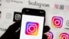 ARHIVA - Simbol Instagrama prikazan na ekranu telefona