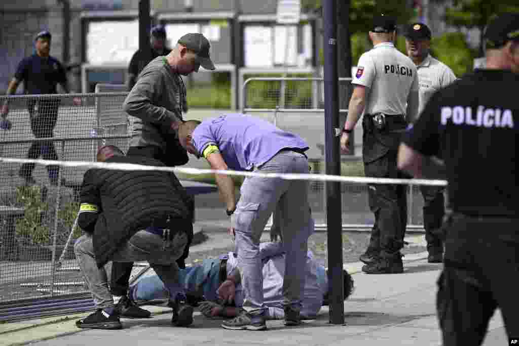 Police arrest a man after Slovak Prime Minister Robert Fico was shot and injured following the cabinet's away-from-home session in the town of Handlova, Slovakia. Fico is in life-threatening condition, according to his Facebook profile.
