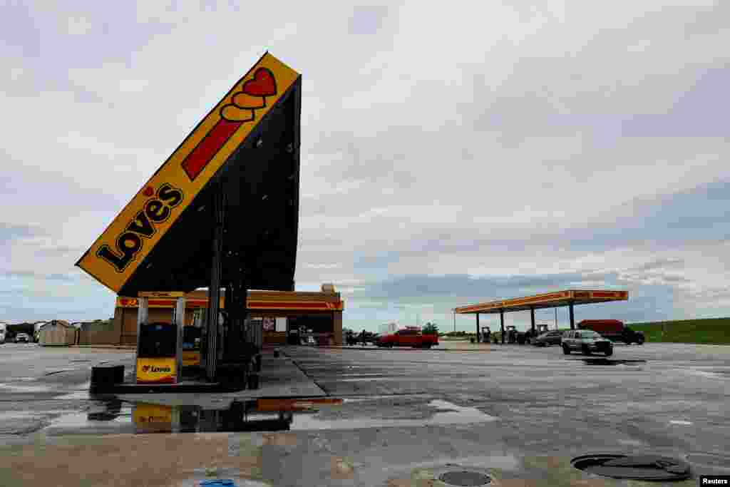 A view shows the damaged roof of a gas station, in the aftermath of Hurricane Beryl in Edna, Texas.