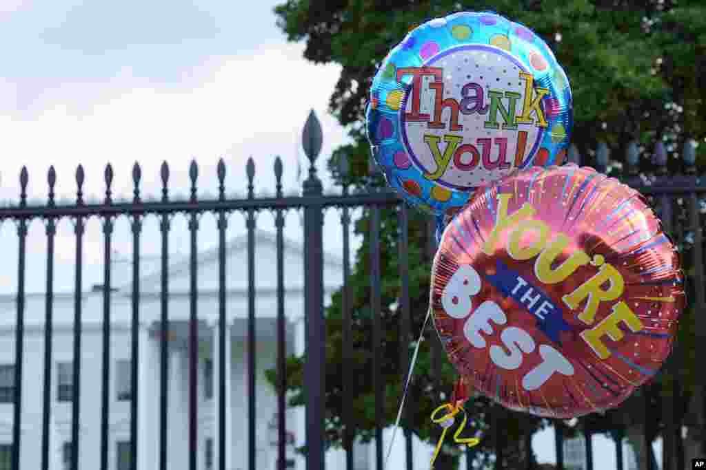 Balloons for President Joe Biden are brought to the White House in Washington, July 21, 2024. Biden dropped out of the 2024 race for the White House, ending his bid for reelection following a disastrous debate with Donald Trump that raised doubts about his fitness for office just four months before the election. 