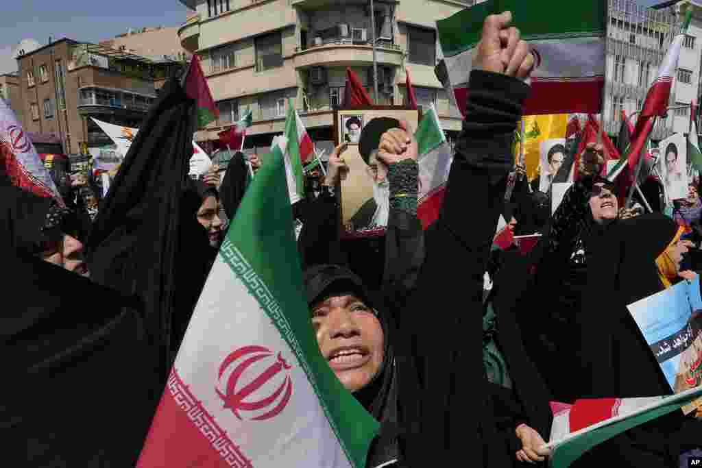 Iranian worshippers chant slogans during an anti-Israeli gathering after Friday prayers in Tehran, Iran.