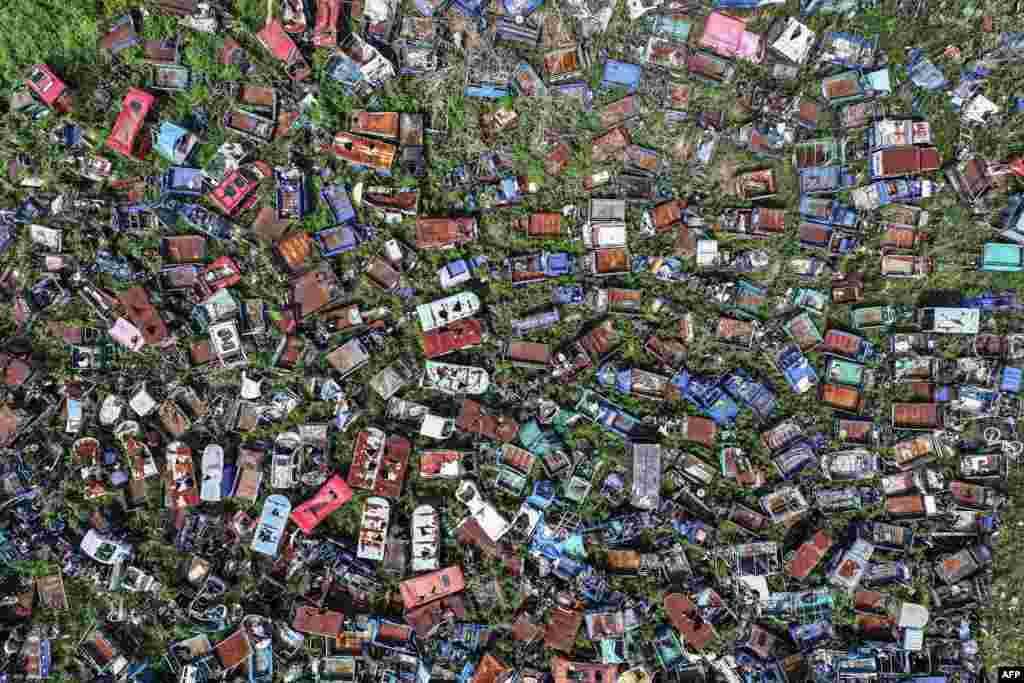 This photo shows an aerial view of abandoned vehicles waiting to be scrapped in Nanjing in eastern China's Jiangsu province.