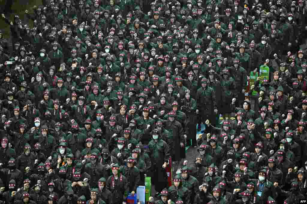Members of the National Samsung Electronics Union stage a rally as they begin a three-day general strike outside the company's foundry and semiconductor factory in Hwaseong, South Korea.