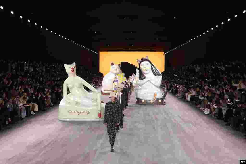 Models present creations from the Dior Spring/Summer 2025 menswear ready to wear collection as part of Paris Fashion Week in Paris.