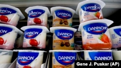 Dannon yogurt sits on display in a market in Pittsburgh, Wednesday, Aug. 8, 2018. (AP Photo/Gene J. Puskar)