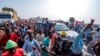 Rabi'u Musa Kwankwaso, presidential candidate of the New Nigerian Peoples Party, greets his supporters during a final election campaign rally in Kano Nigeria, Feb. 23, 2023. 