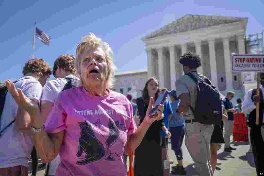 Celeste McCall of Washington reacts in confusion outside the Supreme Court in Washington after decisions were announced. &quot;I&#39;m confused I was told [Trump] has no immunity for unofficial acts,&quot; said McCall. &quot;I don&#39;t even know what that means. I&#39;m beyond confused.&quot;&nbsp;