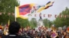 Aksi Protes Aktivis RSF Sambut Kunjungan Xi Jinping di Paris