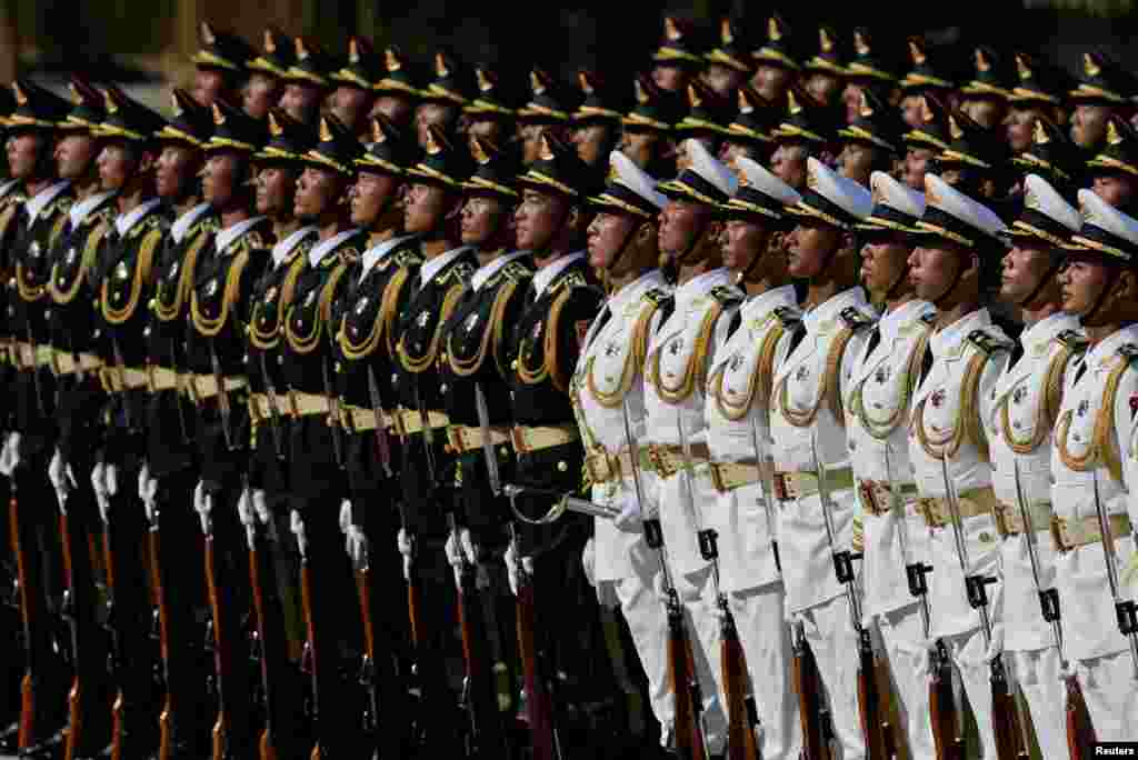 Honor guard members stand during a welcome ceremony for President of Equatorial Guinea Teodoro Obiang Nguema Mbasogo at the Great Hall of the People in Beijing, China.