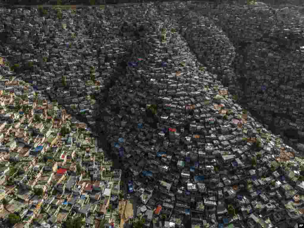 Houses sit on the slopes of the Jalousie neighborhood in Port-au-Prince, Haiti, May 13, 2024.
