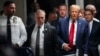 FILE - Donald Trump leaves Manhattan criminal court, Feb. 15, 2024. The president-elect has sought to have a civil judgment against him for fraud set aside.