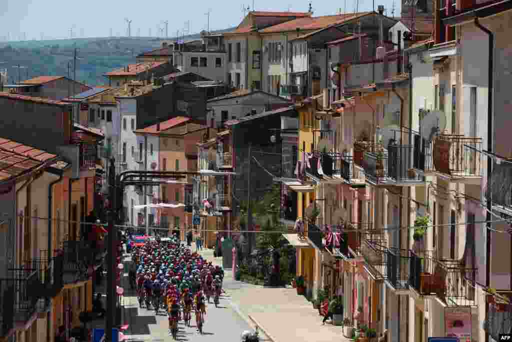 The pack rides in San Bartolomeo in Galdo during the 11th stage of the 107th Giro d'Italia cycling race, 207km between Foiano di Val Fortore and Franca Villa al Mare, Italy.