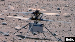 This enhanced color image of NASA's Ingenuity Mars Helicopter was taken by the This enhanced color image of NASA's Ingenuity helicopter was taken by the Mastcam-Z instrument aboard Perseverance on April 16, 2023. (NASA/JPL-Caltech/ASU/MSSS)