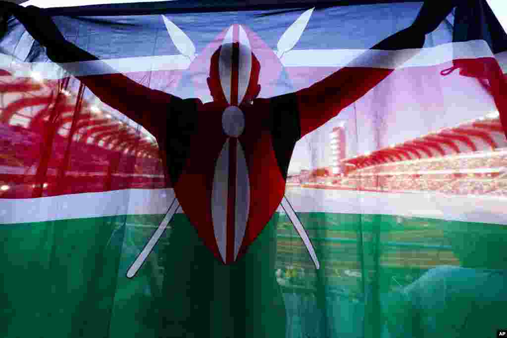 A fan of Kenya holds up a flag during the final in the women&#39;s 5000-meter run the World Athletics Championships, July 23, 2022, in Eugene, Oregon, U.S.