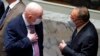 Vassily Nebenzia, left, Russia's U.N. ambassador, confers with Zhang Jun, China's ambassador, before a Security Council meeting on the Russian invasion of Ukraine, Feb. 25, 2022, at U.N. headquarters.