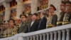 朝鲜领导人金正恩2023年7月27日与来访的中国和俄罗斯高级官员出席大型阅兵式。（朝鲜官方照片）