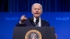 Biden li dema pêşkêşkirina axaftinekê li kongreya NAACP li Las Vegas, 16'ê Tîrmehê, 2024.