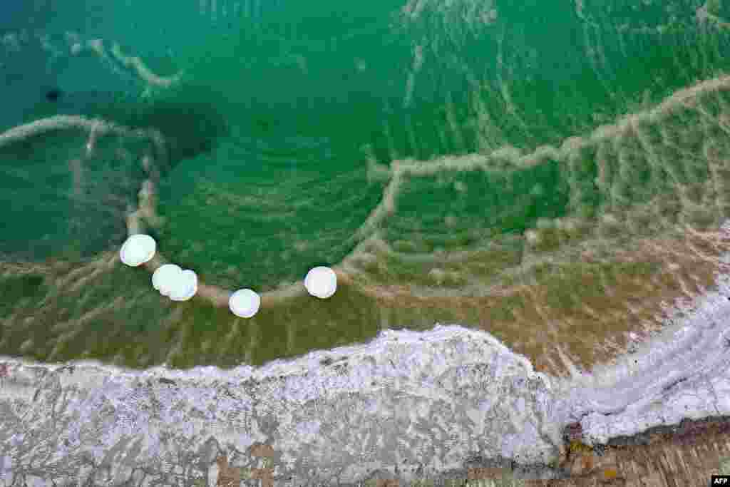 An aerial view of salt formation in the southern part of the Dead Sea near Israel&#39;s Neve Zohar resort, Jan. 9, 2023.