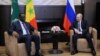 Russia's President Vladimir Putin (right) attends a meeting with Senegal's President Macky Sall, who is currently the chairman of the African Union, at the Bocharov Ruchei state residence in Sochi, Russia, June 3, 2022, in a Sputnik/Mikhail Klimentyev/Kre
