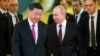 2019年6月5日,中国国家主席习近平和俄罗斯总统普京步入莫斯科克里姆林宫会谈大厅.