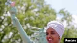 FILE - U.S. Representative Ilhan Omar addresses a rally on immigration rights at the temporary installation of a replica of the Statue of Liberty at Union Station in Washington, May 16, 2019.