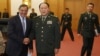 U.S. Defense Secretary Leon Panetta, left, and Chinese Defense Minister Liang Guanglie shake hands before their delegations meet at the Bayi Building in Beijing, China, September 18, 2012.