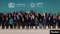 Rêberên cîhanê ku beşdarî 29. ya Konferansa Guherîna Avhewayê ya Neteweyên Yekbûyî ya 2024’an, ku bi navê COP29 tê zanîn dibin, Baku, Azerbaycan 12’ê Mijdara 2024’an.