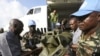The bodies of the United Nations peacekeepers killed in western Ivory coast near the Liberia border arrive in Abidjan June 9, 2012. 