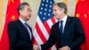 US Secretary of State Antony Blinken, right, shakes hands with China's Foreign Minister Wang Yi during a meeting in Nusa Dua on the Indonesian resort island of Bali, July 9, 2022.
