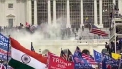 Capitol Hill attack_Indian guy with Flag