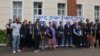 Members of the EU observer mission team pose for a group photo before their deployment Thursday in Blantyre.