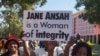 Protesters carry signs during a Jane Ansah solidarity march in Blantyre, Malawi, July 10, 2019. (Lameck Masina)