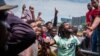 FILE - People protest the killing of more than 20 people and the displacement of residents in Burayu town, at Meskel Square in Addis Ababa, Ethiopia, Sept. 17, 2018.