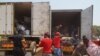 Victims of xenophobia arrive in Malawi fleeing attacks in South Africa. (VOA/L. Masina)