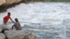 Fisherman catch fish using their nets in this Monday, May, 23, 2016 photo in Machinga Malawi.