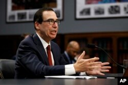 Treasury Secretary Steven Mnuchin testifies before a House Appropriations subcommittee, April 9, 2019, on Capitol Hill in Washington.