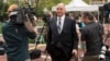 Paul Manafort's lawyer Thomas Zehnle (C) is surrounded by media as he arrives at the courthouse in Alexandria, Virginia, July 31, 2018.