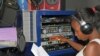 Florence Mwale a host of Business Today show at Capita Radio presses profanity delay system that can block obscene and offensive language.