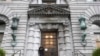 FILE - A man stands outside the main door of the 9th U.S. Circuit Court of Appeals building in San Francisco, Feb. 9, 2017. In President Donald Trump's judicial appointments, he has prioritized nominating federal appeals judges.
