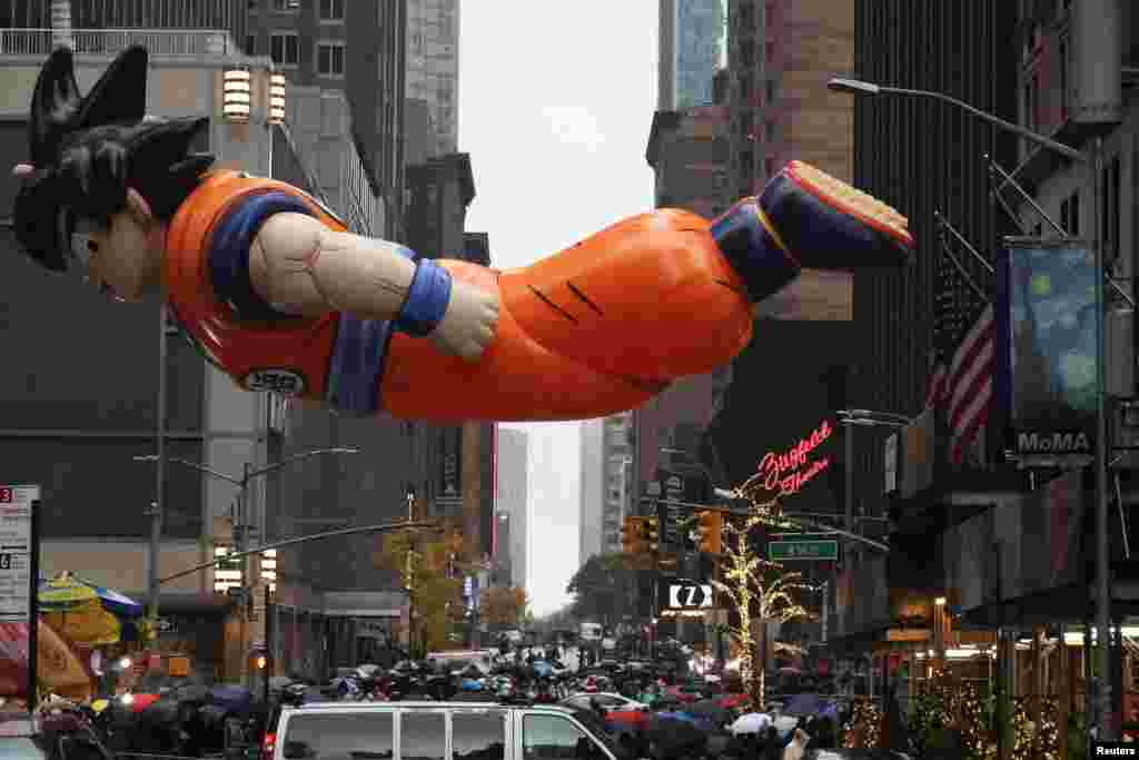 Goku balloon flies during the Macy's Thanksgiving Day Parade in New York City, Nov. 28, 2024.