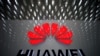 FILE - A Huawei company logo at Shenzhen International Airport in Shenzhen, Guangdong province, China.