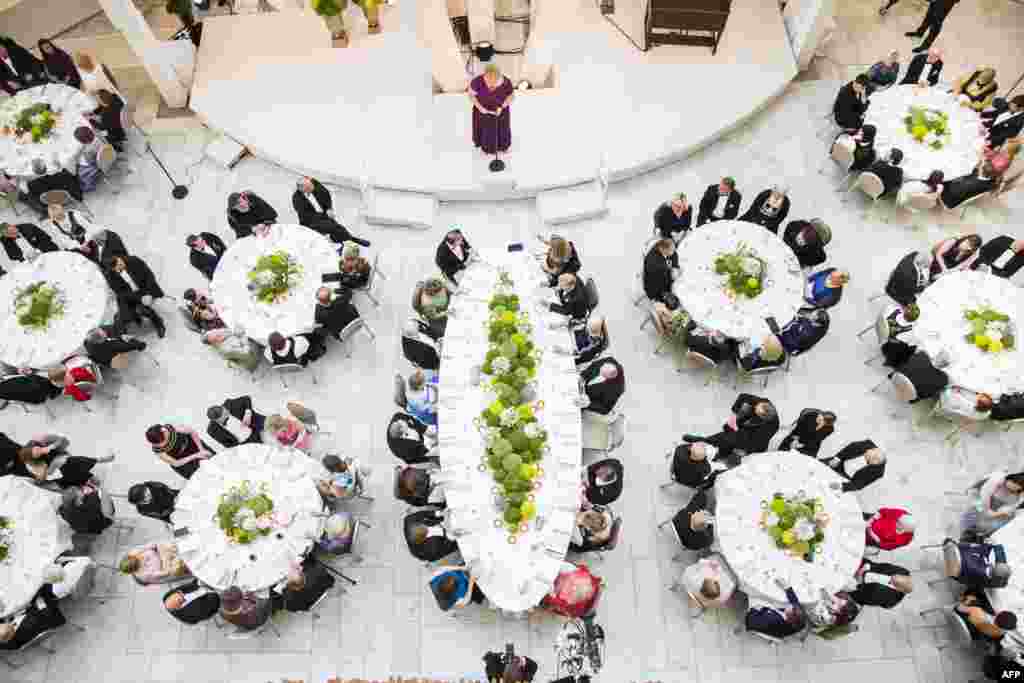Norway's Prime Minister Erna Solberg makes a speech during a gala dinner at the Opera House in Oslo in celebration of the 80th birthdays of King Harald and Queen Sonja of Norway.