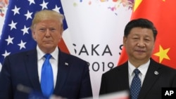 2019年6月29日特朗普和习近平在G20峰会上。