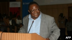 FILE - Tanzanian opposition politician Tundu Lissu speaks during the Tanganyika Law Society (TLS) annual meeting in Arusha, during which he was elected as president, March 17, 2017.