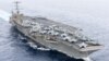 美國海軍提供的照片顯示尼米茲級“杜魯門號”航空母艦經過直布羅陀海峽。 (2024年12月25日)