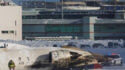 達美客機在多倫多皮爾遜機場著陸時翻倒19人受傷